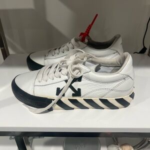 Low top off white shoes